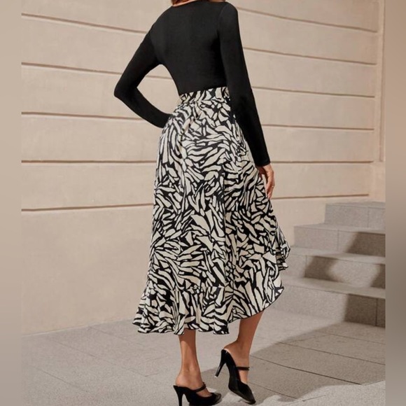 Black/Cream Asymmetrical Ruffle Hem Belted Dress - Picture 2 of 8